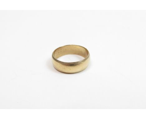 A 9 carat gold plain wedding ring, 5.1 g gross