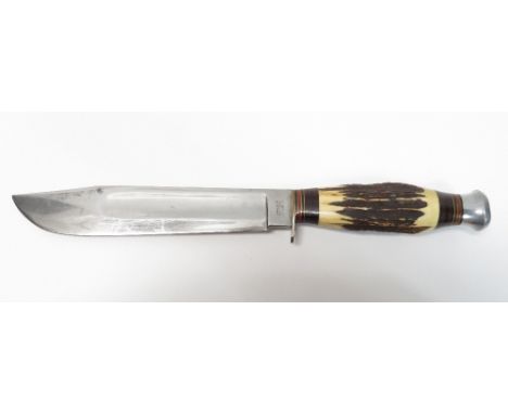 A large hunting knife, the blade of Bowie design with antler handle, blade stamped William Rogers, Sheffield, blade 20cm long