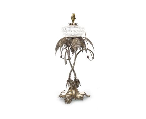 VICTORIAN SILVER PLATED TABLE CENTRE PIECEformed as two interlocking palm trees, above a spreading, lobed base, mounted with 