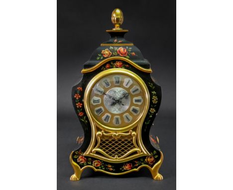Jaeger-LeCoultre Atmos; a bracket clock, in mid 18th century style, the shaped black lacquered case painted with flowers and 