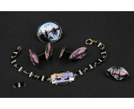 A small collection of enamelled silver jewellery, comprising; a Norwegian silver and enamel bracelet designed with a reindeer
