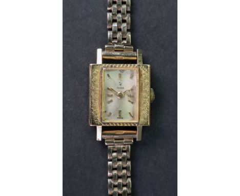 Tudor; a lady's 18ct gold bracelet watch, circa 1966, the rectangular dial with raised gilt baton hour markers and hands, wit