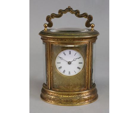 An oval brass cased carriage clock, circa 1880, engraved with flowers and leafy scrollwork, the circular dial with Roman nume