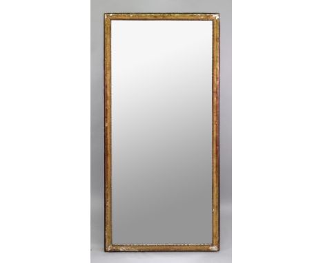 A rectangular giltwood and gesso frame pier mirror, first half 18th century, with a divided rectangular plate, the moulded fr