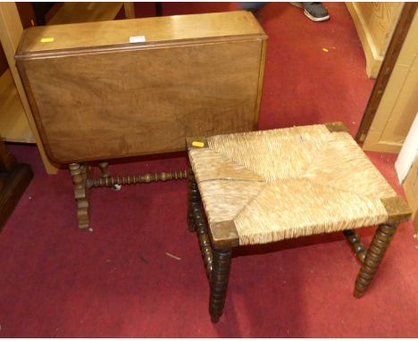 A mid-Victorian walnut Sutherland table; together with a rush topped bobbin  turned stool (2)