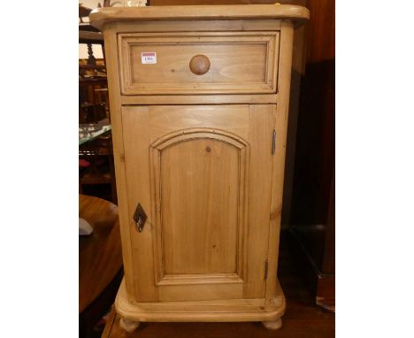 A modern pine round cornered single door bedside cupboard, with single upper drawer, w.48cm; together with a contemporary har