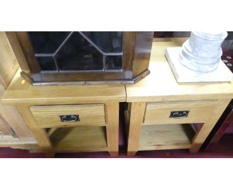 A pair of contemporary blond oak single drawer two-tier lamp tables, w.55cm 