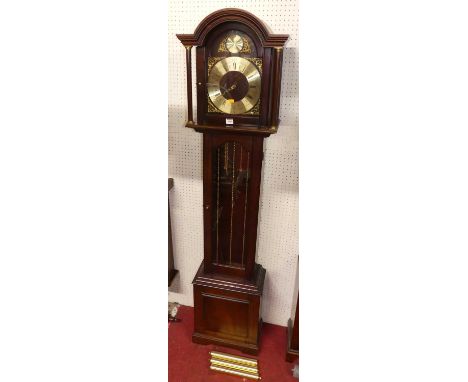 A contemporary mahogany Tempus Fugit grandmother clock, having a glazed trunk door, with triple weight driven movement, with 