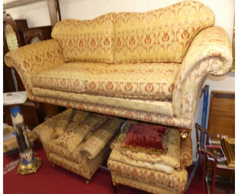 A contemporary floral fabric upholstered two-piece suite, comprising; three-seater sofa and single armchair, having rolled ar