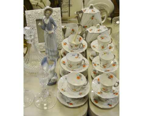 Ceramics & glassware - A Lladro figure of an elegant lady; a Crosa figure of the entwined lovers; a RKG of Czechoslovakia cof