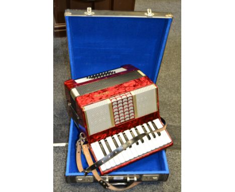 A Galotta 32 button piano accordion in original fitted case