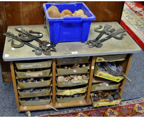 A chest of fixtures and fittings George III and later; a Victorian tripod base; 19th Century farmhouse door brackets