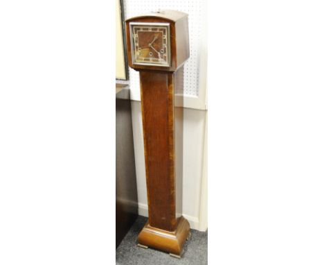 An Art Deco walnut grand daughter clock, trio winding holes, c.1930