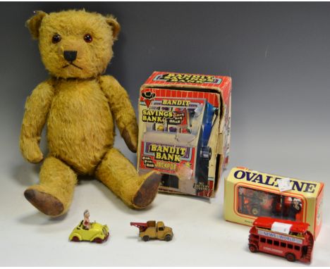 A mid 20th century jointed mohair teddy bear; a Bandit savings bank; a Noddy and His Car; etc.