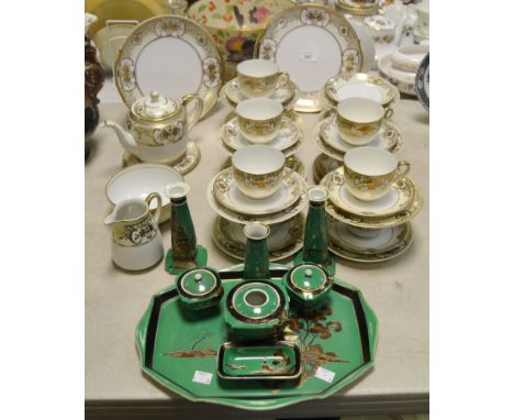 A Noritake tea service in gold; a Noritake dressing table set c.1925
