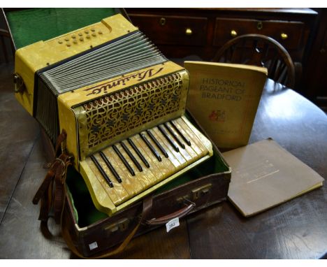 An Accordion (cased); 2 books on Bradford