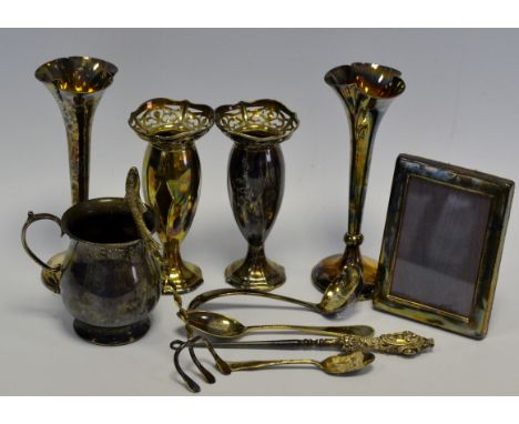 A pair of silver bud vases,weighted, Birmingham, marks rubbed; a silver coloured metal christening mug; EPNS specimen vases; 