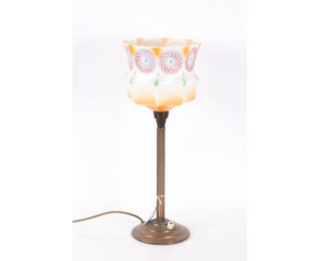 Art Deco copper table lamp, having swirl decorated glass shade, with fluted column and stepped circular base, 42.5cm tall