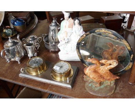 Oval mirror with Chinese lacquer frame, silver plated tea set, clock/barometer set and cast iron ducks doorstop