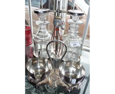 19th c. silver plated two-bottle tantalus with key, together with a silver plated milk jug and sugar bowl on stand