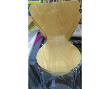 Set of six light bent plywood dinnings chair on four chromed supports 