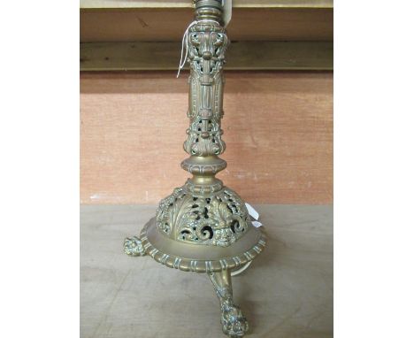 Mid C20th cast brass table lamp with pierced decoration on three brass paw feet H39cm, C19th copper and brass warming pan wit
