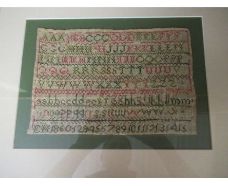 Victorian cross-stitch alphabet sampler by Bews depicting cottage, trees and dog W39cm H41.5cm and a similar cross-stitch alp