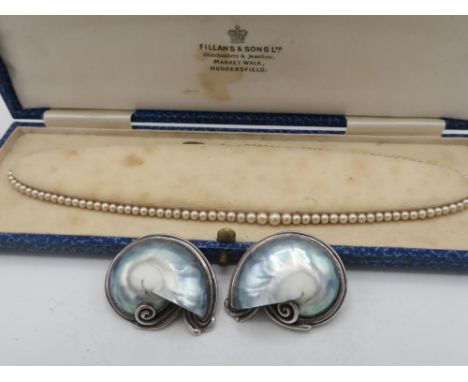 Graduated simulated pearl necklace with a Sterling silver fish hook clasp decorated with three marquisate stones, Fillan &amp