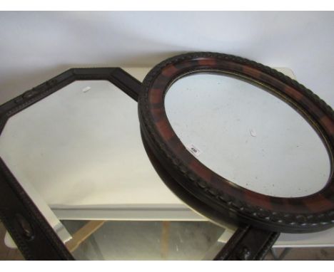 Victorian oval mirror in simulated Zebra wood frame and a 1930's bevel edged mirror in Jacobean style oak frame (2) 