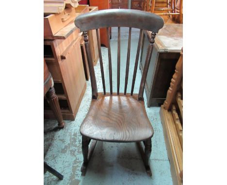 Victorian beech and elm stick back rocking chair and a Victorian style kitchen armchair 