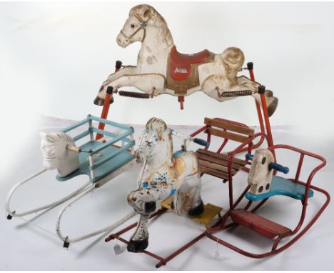 Four assorted cast metal Tri-ang and Mobo Rocking horses, circa 1960, including Mobo child’s white bouncer horse mounted on m