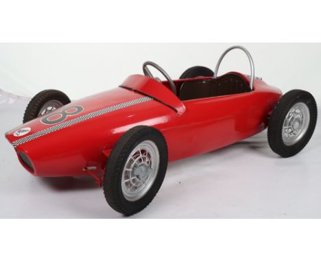 A scarce M & G (Morellett & Guerineae) Honda child’s motor racing pedal car, French circa 1970, red painted pressed steel bod