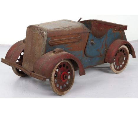 A scarce Leeway barn find pressed steel child’s Saloon pedal car, English 1940s, with one opening door, metal dummy rear hood