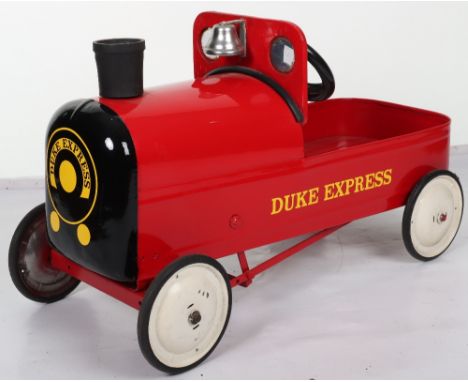 Tri-ang ‘The Duke Express’ child’s pedal train, English circa 1960, red painted pressed steel body with black grill and steer