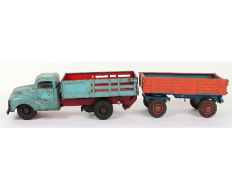 Gama tinplate clockwork truck and trailer, W.Germany 1950s, light blue truck with hand operated tailboard, rubber tyres and w