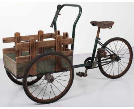 Unusual metal and wooden child’s delivery tricycle, 1930s, metal framed tricycle with leather seat and chain pedal drive to r