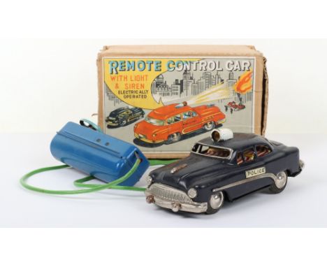 Boxed tinplate remote control Police car by KKS of Japan, 1950s, finished in dark blue with chrome grill and bumpers, lithogr