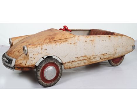 A scarce M & G (Morellett & Guerineae) Citroen DS pressed steel child’s pedal car, French 1964, with padded shaped metal seat