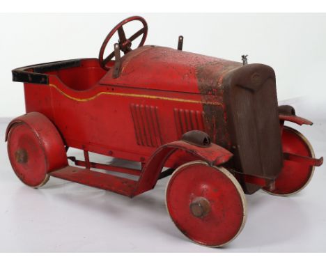 A scarce Leeway pressed steel child’s Saloon pedal car, English 1940s, original painted red body with yellow coach-line, open