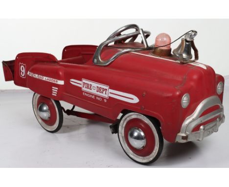 A Murry pressed steel child’s pedal Fire Dept Engine, American circa 1980, painted in red with white bonnet lines and Fire De