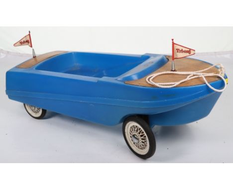 Tri-ang plastic child’s pull-along/ pedal boat, English 1970s, blue moulded plastic body with metal chassis and metal peddles