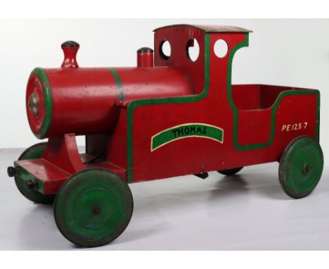 A wood and steel Leeway Flyer child’s pedal locomotive, English 1970s, the red and green painted engine with steel boiler and