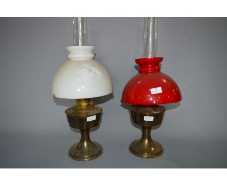 Two Brass Oil Lamp with Read & White Shades 