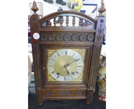 OAK BRACKET CLOCK. Oak cased chiming bracket clock with gong movement signed W H and galleried top