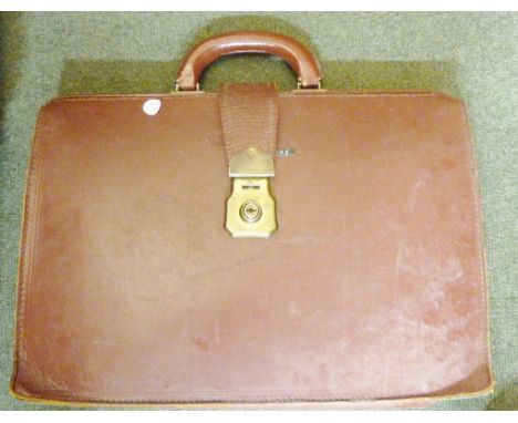 LEATHER BRIEFCASE. Vintage leather briefcase 