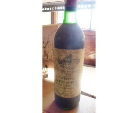 VINTAGE WINE. Bottle of vintage Chateau Le Tour De Blanchon 1974