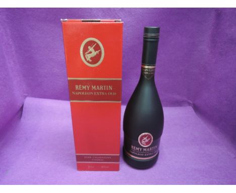 A bottle of Remy Martin Napoleon Extra Old Fine Champagne Cognac, in box