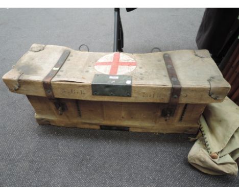 A World War I canvas covered large wooden trunk with Red Cross mark on lid, R.C.D. also on lid