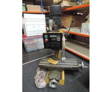 A Hobby MAT BFE65 Milling Machine with many accessories, tools and instruction booklet
