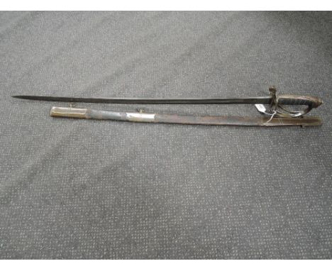 A British Infantry officer's sword 1860 with leather and metal scabbard, brass half basket hilt, military marks on blade, 7.0